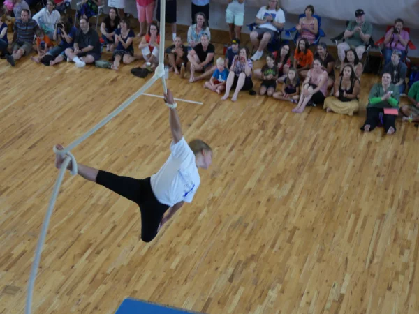 Youth student on trapeze